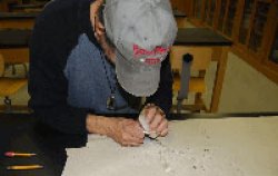 student studying minerals