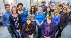 Director of the Center for Writing Excellence (CWE) Melinda Knight (seated, right) and Assistant Director Alicia Remolde (seated, left) with CWE consultants and staff. Standing, from the left are Alan Smith, Heather Lockhart, Tricia Valatka, Jamie Abarca, Janet Dengel, Norman DeFilippo, Nicole Papaioannou, Emily Lagg, Gloria Lugo, Vanessa Phillips and Alice Freddi Beresin.