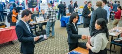 employers and students speaking at career fair