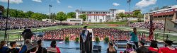view of graduating class from behind speaker's podium at CHSS convocation