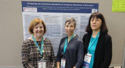 Mary Boyle, Christa Akers, and Roberta Elman with their poster at the recent ASHA convention in Boston.