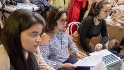 Photo of Montclair State Spanish Majors with headseats on