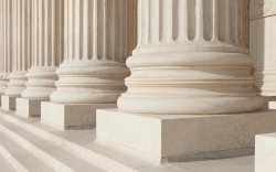 photo of greek columns on front steps of government building