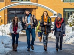Students walking on campus in snow