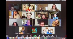 screenshot of a Zoom call with smallers quares of particpant video. Some particpants have cats or are wearing cat ears