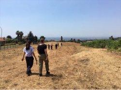 people walking at the Village of the Antonines Site