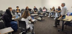 Photo of Dean Kingstone speaking to class