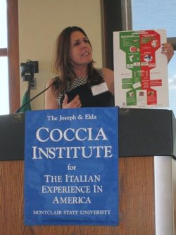 Enza Antenos-Conforti speaking from podium