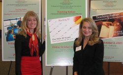 Victoria Butcher and Mary Ann Re in front of posters