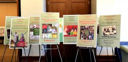 Image of 9 teaching symposium posters on easels