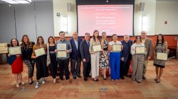 Students and faculty posing for photo at the Scholarship Award Ceremony
