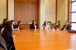 People sitting around a conference table