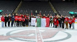 People standing on hockey rink attending the NJ Devils First Annual Italian Heritage night