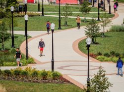 Students walking through campus near Cafe Diem and Memorial Auditorium