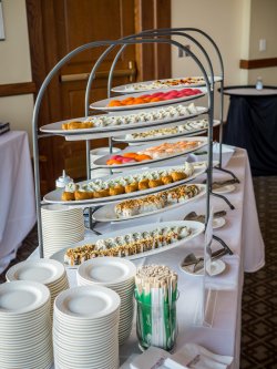 Some sushi displayed on a table at an event in the Main Ballroom of the Conference Center.