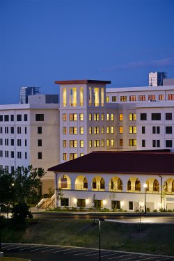 The exterior of the Heights at Montclair State University at night.