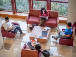 Students in lounge wearing masks