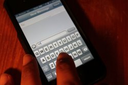 stock photo of someone texting