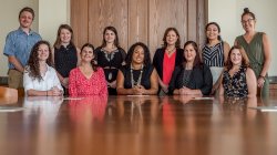 Photo of CREEHS faculty and staff in a classroom.