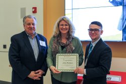 John Walters receiving participation award