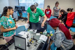 MSU student with STEM teen students