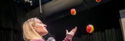 student practicing juggling