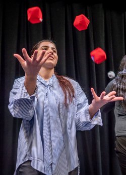 student learning to juggle
