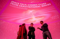 Marc Favata speaking with attendees after his Space Talk