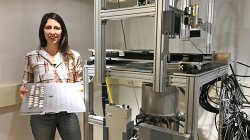 Christina Verhagen next to lab equipment