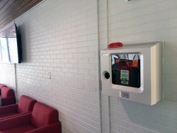 An AED machine on the wall of the Student Center.