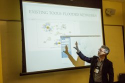 Image of a faculty member presenting about Digital Humanities.