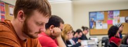 Image of students listening in a creative writing class.