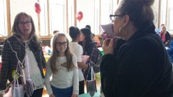 Young student and mother at event