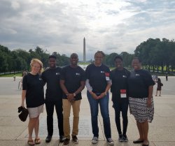 Students in front of reflecting pool and Washington Monument