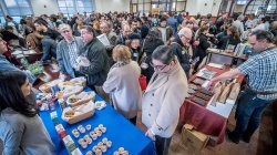 Crowd tries samples at more than a dozen stations at the March 19 food entrepreneurs event.