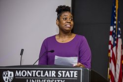 Alicia-Ann Caesar speaks during the Promise Prize ceremony.