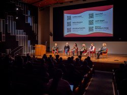 A panel of women entrepreneurs onstage.