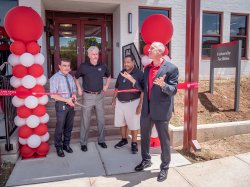 Facilities administation at ribbon-cutting ceremony