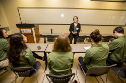 Facilities staff member speaking with the 2019 Facilities Green Team
