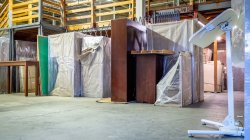 Photo of surplus furniture in storage area.