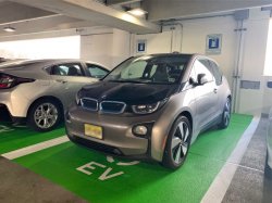 Photo of cars using the electric vehicle (EV) charging stations in the Red Hawk Parking Deck