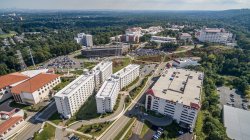 Aerial photo looking south to view campus beginning at the Carparc Diem Deck.