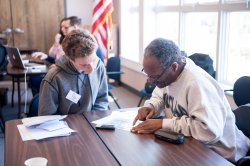 Student interviewing a Montclair resident.