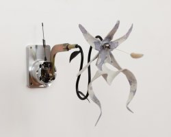 A multimedia sculpture in the shape of a flower.