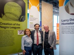 From Left: Laura Muth, Montclair President Jonathan Koppell, and Chuck Muth '77 in The Charles J. Muth Museum at Hinchliffe Stadium.