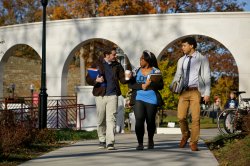 Students walking on path near Student Center courtyard