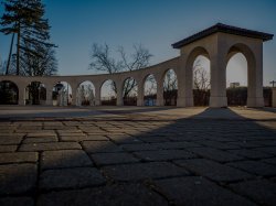 Outside of College Hall during sunset.