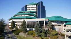 Overlook building with green roof and mirrored windows
