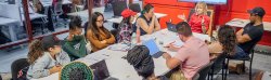 SCM professor in class with students