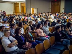 people sitting in auditorium